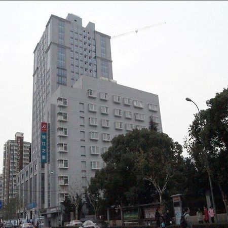 Jingjiang Inn Shanghai Minsheng Road Bagian luar foto