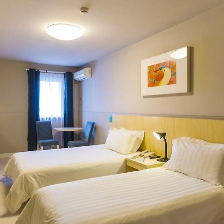 Jingjiang Inn Shanghai Minsheng Road Bagian luar foto