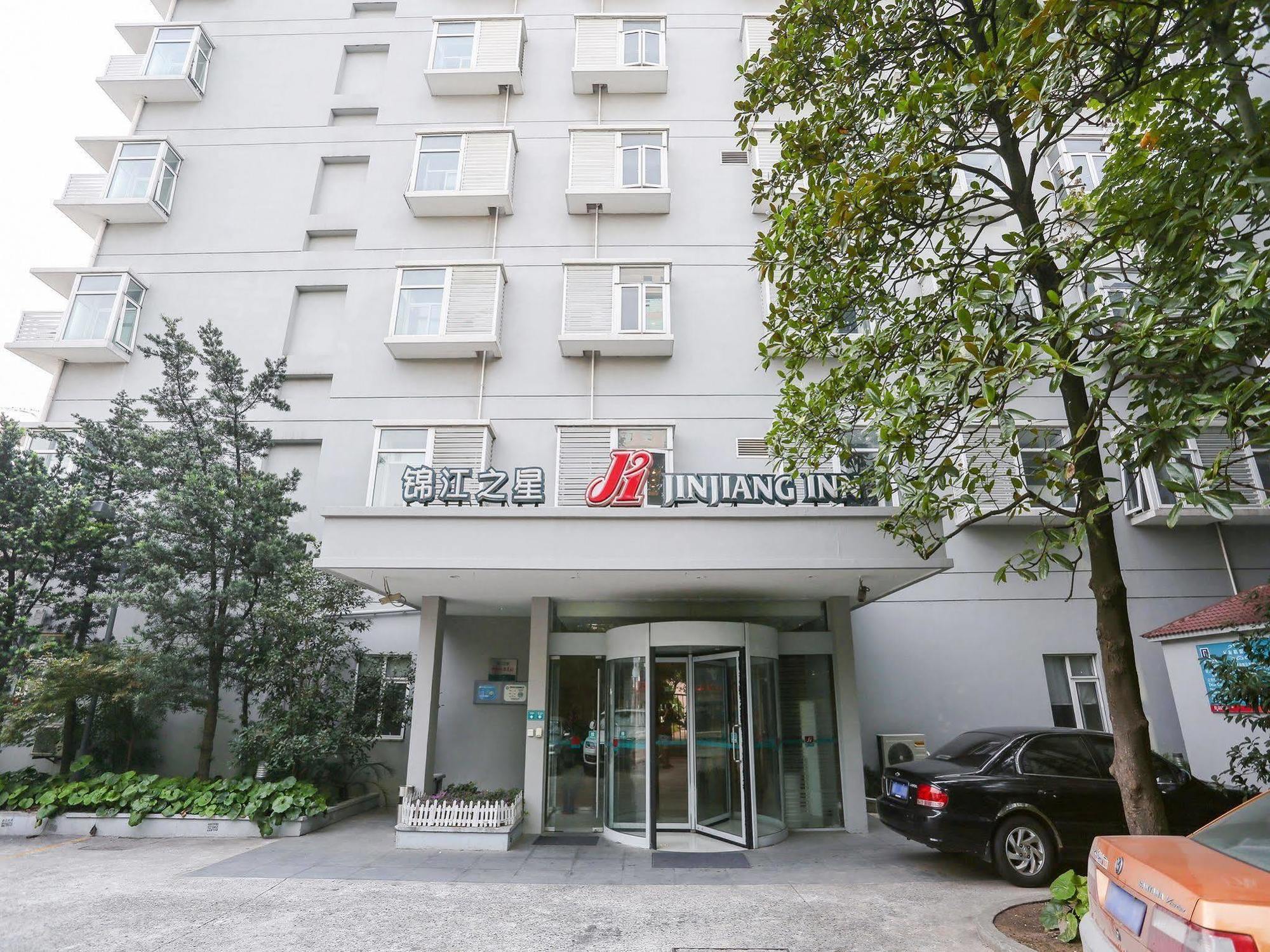 Jingjiang Inn Shanghai Minsheng Road Bagian luar foto